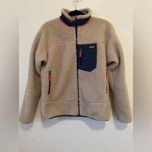 Patagonia Beige Sherpa Jacket with Navy Chest Pocket and Red Trim